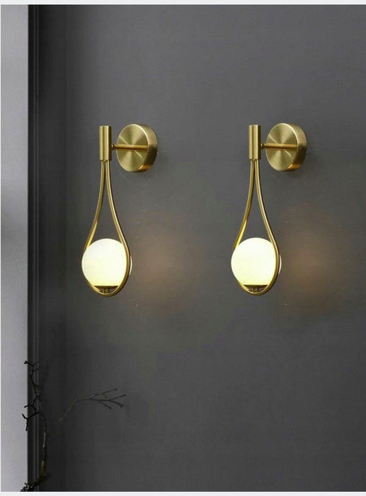 A set of 2 wall lamps milk ball gold